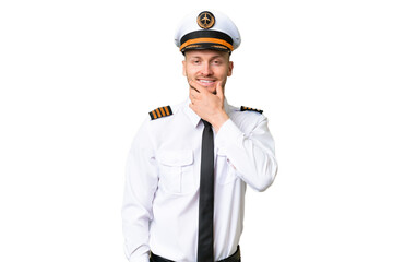 Airplane pilot man over isolated background smiling