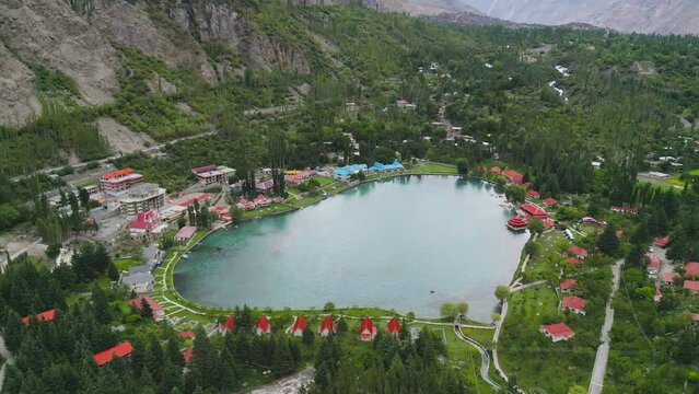 Aerial top view of heart love shape pond river lake in Karakoram high mountain hills. Nature landscape background, Skardu,Gilgit, Pakistan. Travel on holiday vacation.