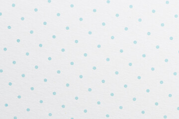 Blue polka dot paper as background or texture.