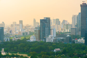 Aerial view Bangkok city Lumpini public park with office building urban background