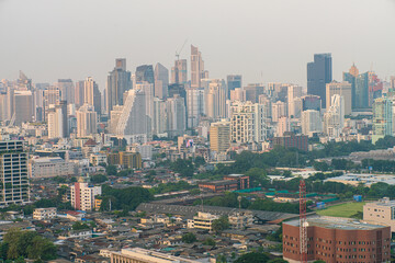 Aerial view Bangkok city Lumpini public park with office building urban background