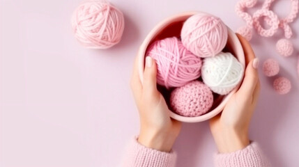 Fototapeta na wymiar Female hands BEAUTIFUL close-up, knitting for a newborn, crochet.booties, top view on a soft pink blue beige background,tenderness,knitting needles,cotton,twig.AI generated