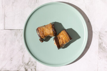 Georgian eggplant  phali or pkhali with walnuts, garlic and spices on black plate