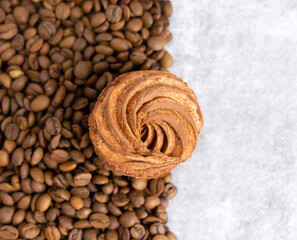 homemade marshmallow zephyr with coffee and caramel.natural ingredients.open book coffee cup.woman hand taking one piece.smiling face from coffee beans.dessert in box, or torn paper, diagonal lines