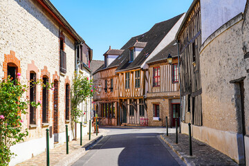 Half-timbered houses in the main shopping street of the popular medieval town of Provins in Seine...