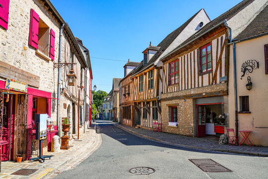 Fototapeta Half-timbered houses in the main shopping street of the popular medieval town of Provins in Seine et Marne, Paris region, France