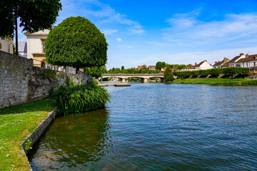 Fototapeta na wymiar View of the Bridge of Fraternity spanning the Loing river in Nemours, a small town in the south of the Seine et Marne department in Paris region, France
