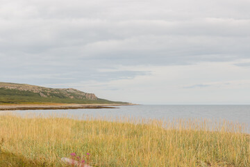 Background of the surroundings of the Rybachy peninsula. Barents Sea