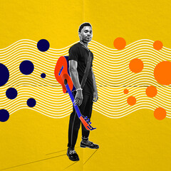 Handsome, young, african man, musician with guitar against yellow background. Jazz, rock and roll....