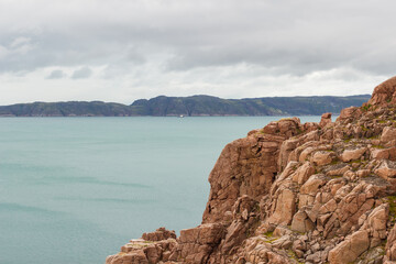 Background on the sea coast near Teriberka. The northern sea coast.