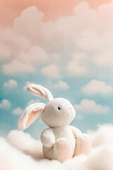 Obraz na płótnie Canvas happy baby toy rabbit sitting on fluffy clouds ,fix toy in the clouds,lamb toy on sky