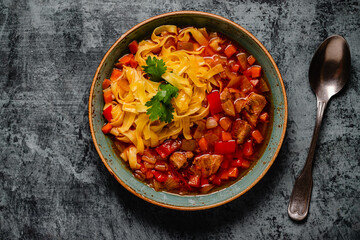 Lagman soup with lamb, homemade noodles and vegetables.