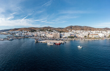 Fototapeta na wymiar Tinos island Hora town Greece Cyclades. Aerial drone view of port Aegean sea, summer vacation.