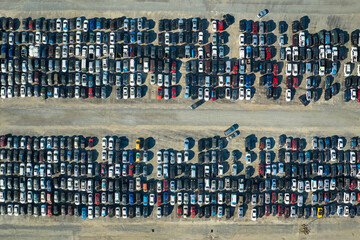 Aerial view of auction reseller company big parking lot with parked cars ready for remarketing services. Sales of secondhand vehicles - obrazy, fototapety, plakaty