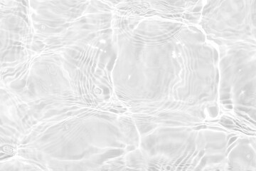 Fototapeta White water with ripples on the surface. Defocus blurred transparent white colored clear calm water surface texture with splashes and bubbles. Water waves with shining pattern texture background. obraz