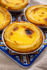 Portugal's traditional sweet dessert Pastel de nata egg custard tart pastry in cup