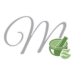 Mortar and pestle with letter m