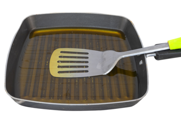 Cooking oil in a pan isolated on white background.PNG