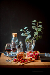 fresh strawberries and wine on kitchen