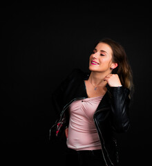 Fototapeta premium Portrait of a woman on a black background