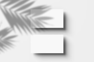 business card mockup with shadow overlay on white background