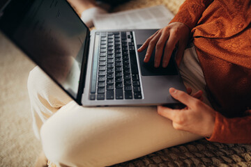 Close-up shot of working on laptop