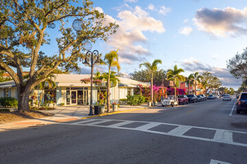 Fototapeta na wymiar View of 3rd street in Naples, Florida. Naples is mostly known for its high-priced homes, white-sand beaches, and numerous golf courses