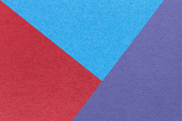 Fototapeta na wymiar Texture of craft red, blue and violet shade color paper background, macro. Structure of vintage abstract cardboard