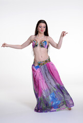 Belly dancer woman studio photography, belly dance is an art form of the dance.