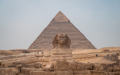 Panoramic view of the Sphinx with the Great Pyramid of Cheops in the background.