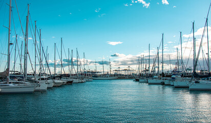 Naklejka premium VALENCIA , SPAIN - DECEMBER 6, 2021: Yachts and boats in Valencia marina