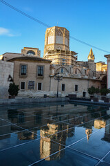 VALENCIA , SPAIN - DECEMBER 8 2021: mirroring historical buildings in Valencia old town