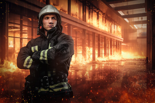 Brave firefighter in full protective gear facing a raging inferno inside an office building. The image is intense and displays the heroism of first responders