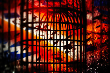 Abstract illustration of a bird cage with birds inside it on a red background. Created with Generative AI.
