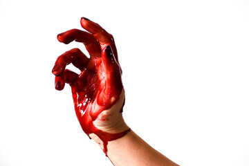 A woman's hand full of blood, or a hand covered in blood.
