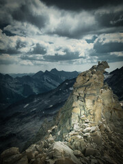 View on jagged mountains of Zillertal alps on a summer day,mountains, rocks, blue sky, clouds.  Zillertal alps/Zillertaler alpen, Austria.  .