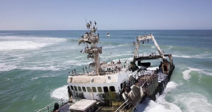 4K Aerial drone footage of an Abandoned Shipwreck Zeila on Famous Skeleton Coast, Namibia. Namibian Atlantic coastline, Zeila L-758 Walvis Bay stranded rusty ship at sand beach in Skeleton Coast Park