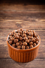 Bowl with cereal chocolate balls.