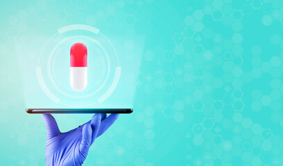 Diet. Nutrition. Healthy nutrition. Vitamin. Online prescription medical concept. Pharmacist. The doctor's hand holds a tablet. A projected pill isolated on green background.