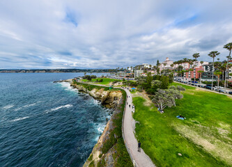 La Jolla Cove, California, from a UAV Drone Aerial View looking at the Town, Coves, Beaches and Cliffs 