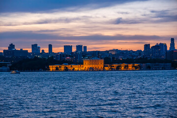 Illuminated architecture Dolmabahce Palace. Night view of istanbul city and skyscrapers. Awesome Panoramic view of Istanbul Bosphorus on night.