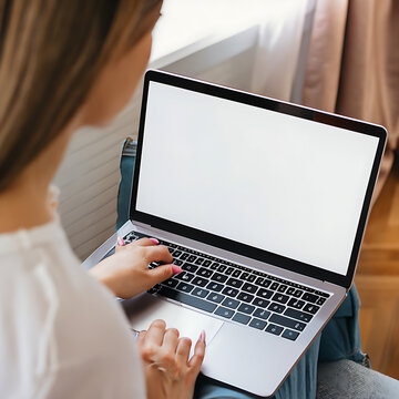 Young woman using laptop computer with blank empty mockup screen. Business man working at home. Freelance, student lifestyle, e-learning, shopping online, web site, technology concept