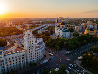 Fototapeta na wymiar Evening summer Voronezh cityscape. Annunciation Cathedral and Tower of Management of South-east railway at sunset