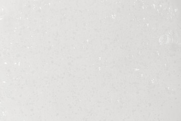 Transparent gel with bubbles on the whole background.