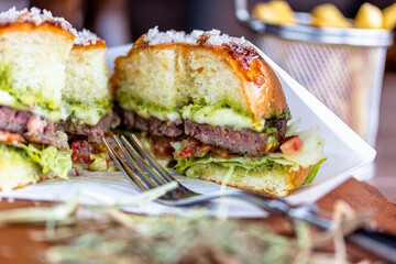 french fries potato in iron grid baket served for kids party close up photo