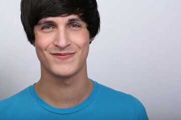 Studio portrait of hip young man.