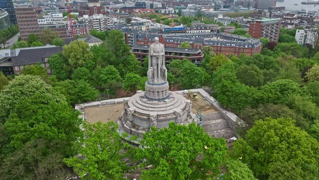 Drone shot of Bismarck Monument ( Bismarck-Denkmal ) , Hamburg , Germany . Large monument featuring a statue of of Otto von Bismarck, the 1st German Chancellor.