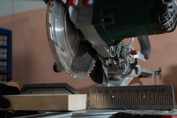 Close-up of a circular saw in a workshop.