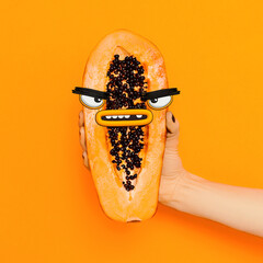 Modern, trendy art collage. Papaya and funny doodle face.