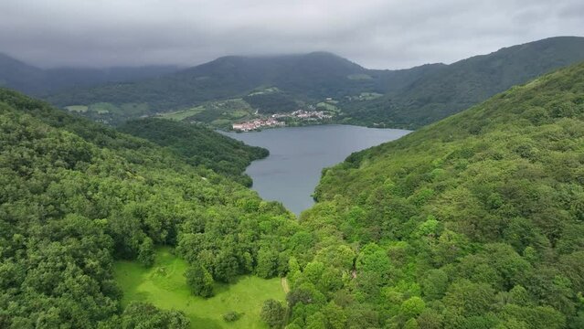 Water reservoir between leafy beech forests. Eugi, Navarra